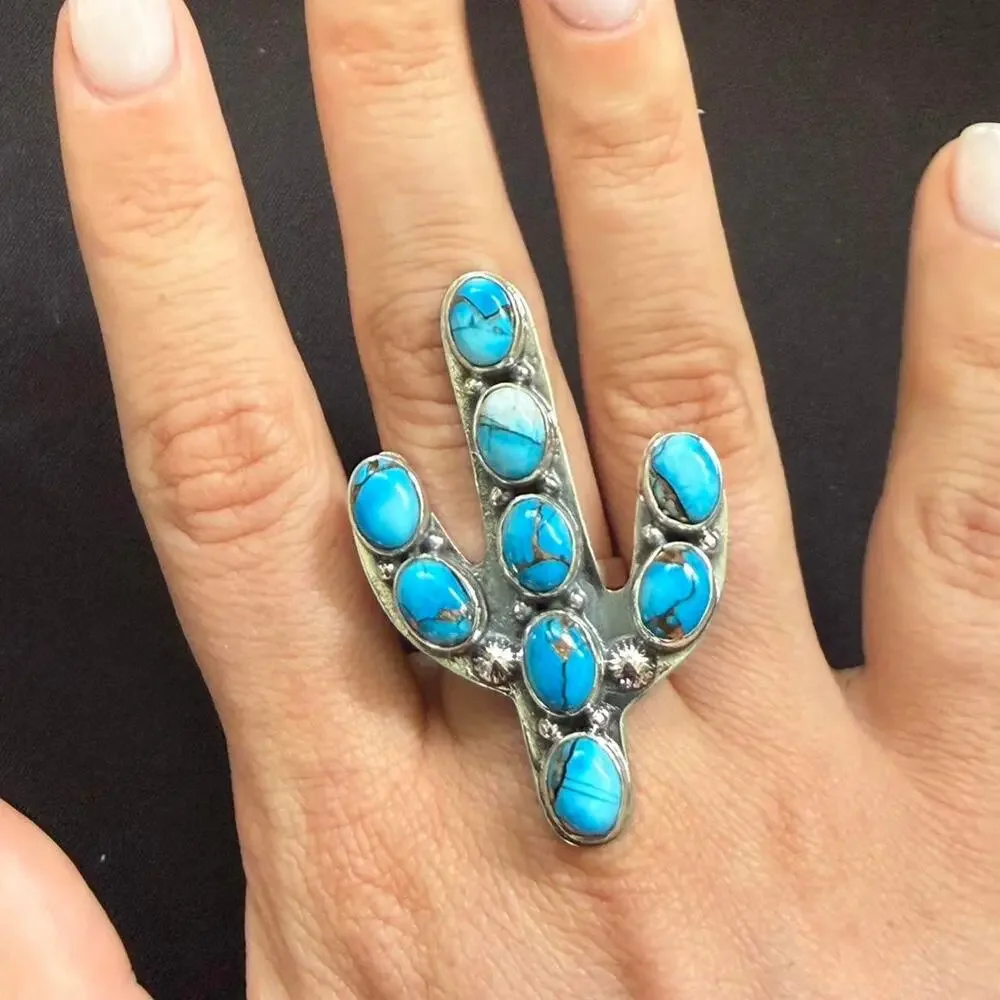Sterling silver handmade turquoise catches ring adjustable size
